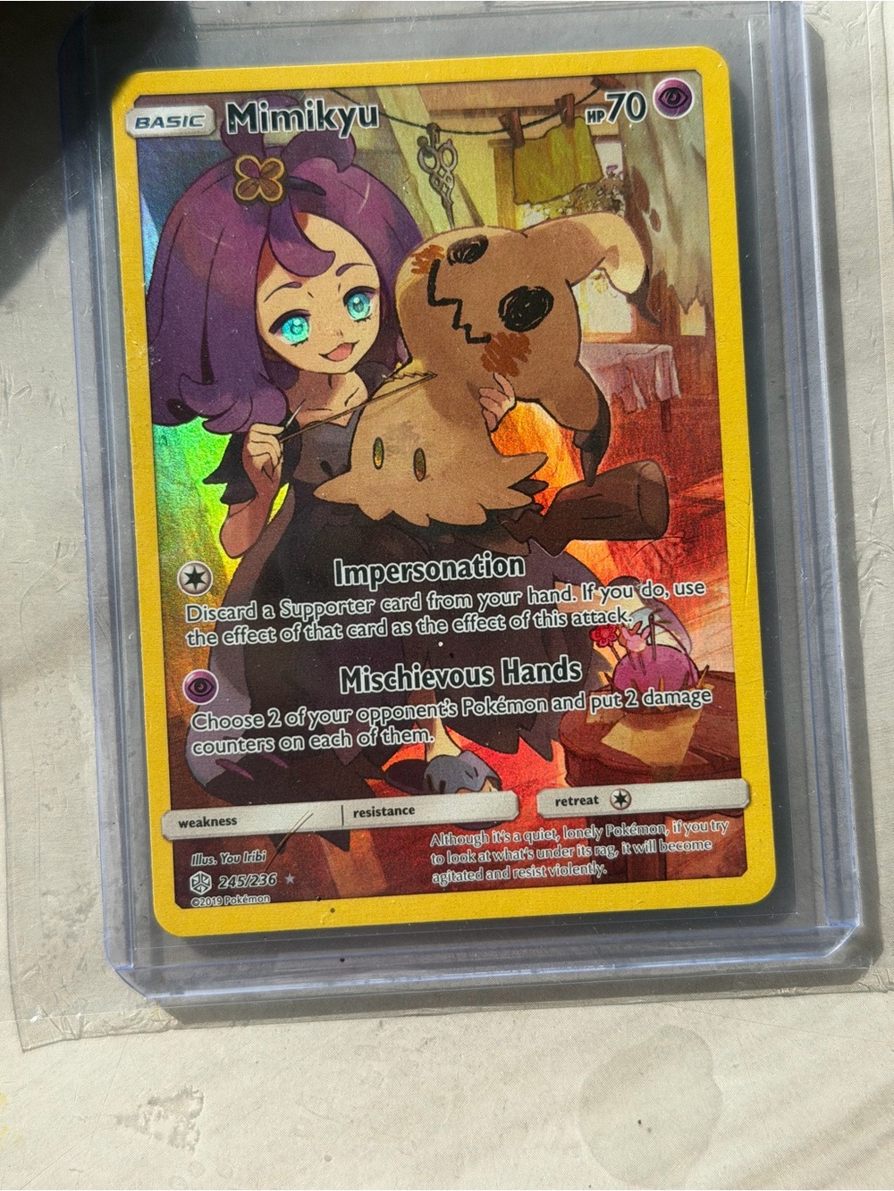 Pokemon Mimikyu Holographic Card with Yellow Border